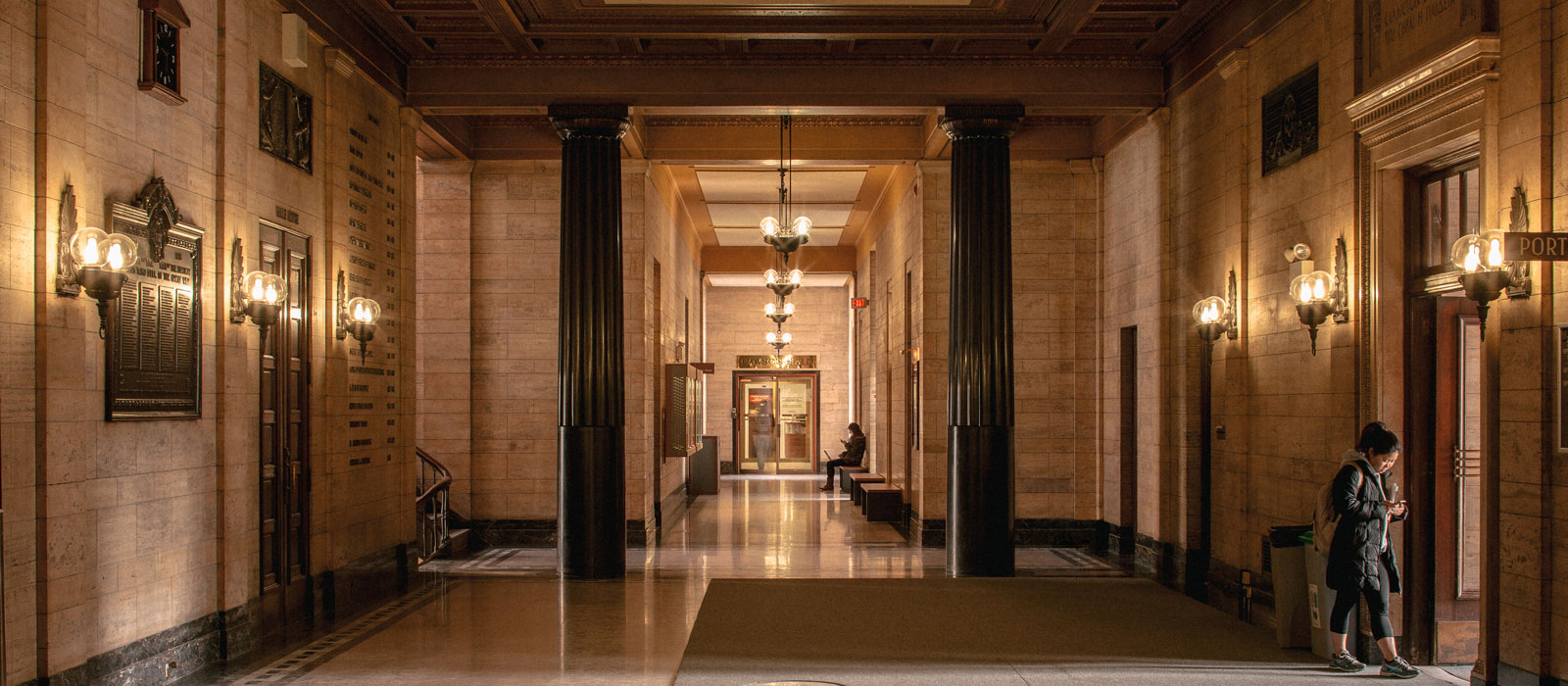 Interior shot of a corridor in a historic campus building.