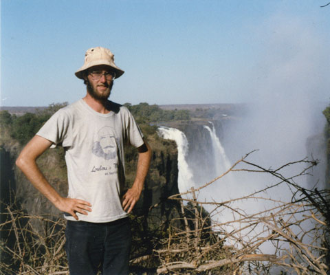 Paul Davidson, president of Universities Canada, as a university student in front of falls in Africa.