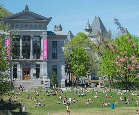 Students siting outside of McGill Campus