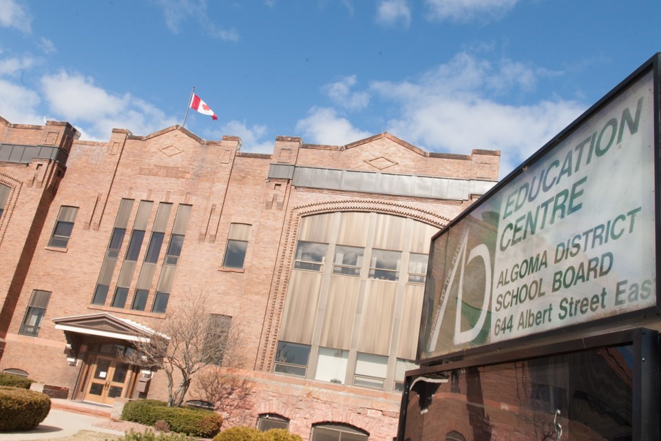 Sign of Education Centre Algoma District School Board and building in the background