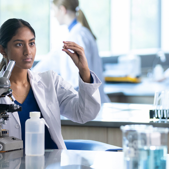 Four student researchers in a lab