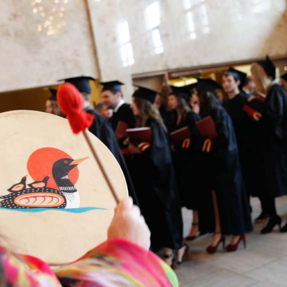 Women with drum in Graduation party