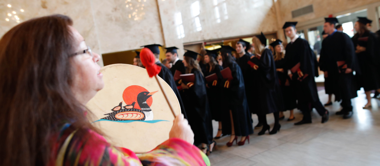 Women with drum in Graduation party