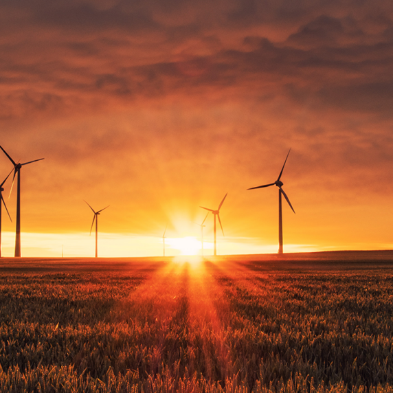 wind energy accelerate with sunrise in background