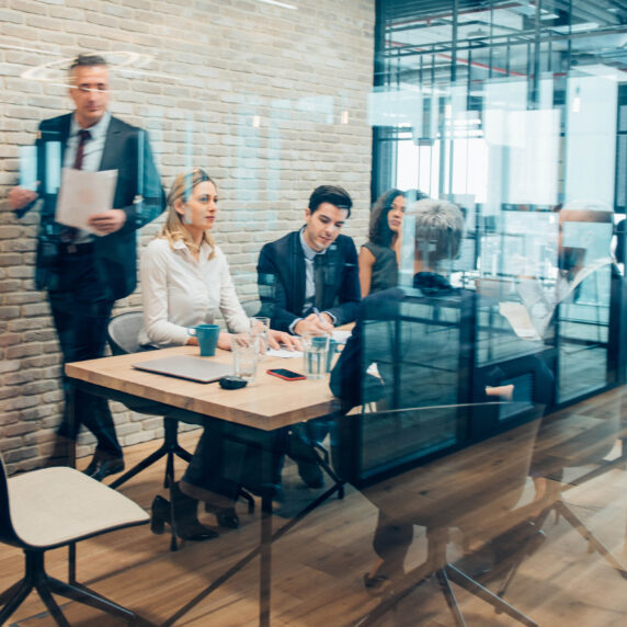 People collaborating around a table.