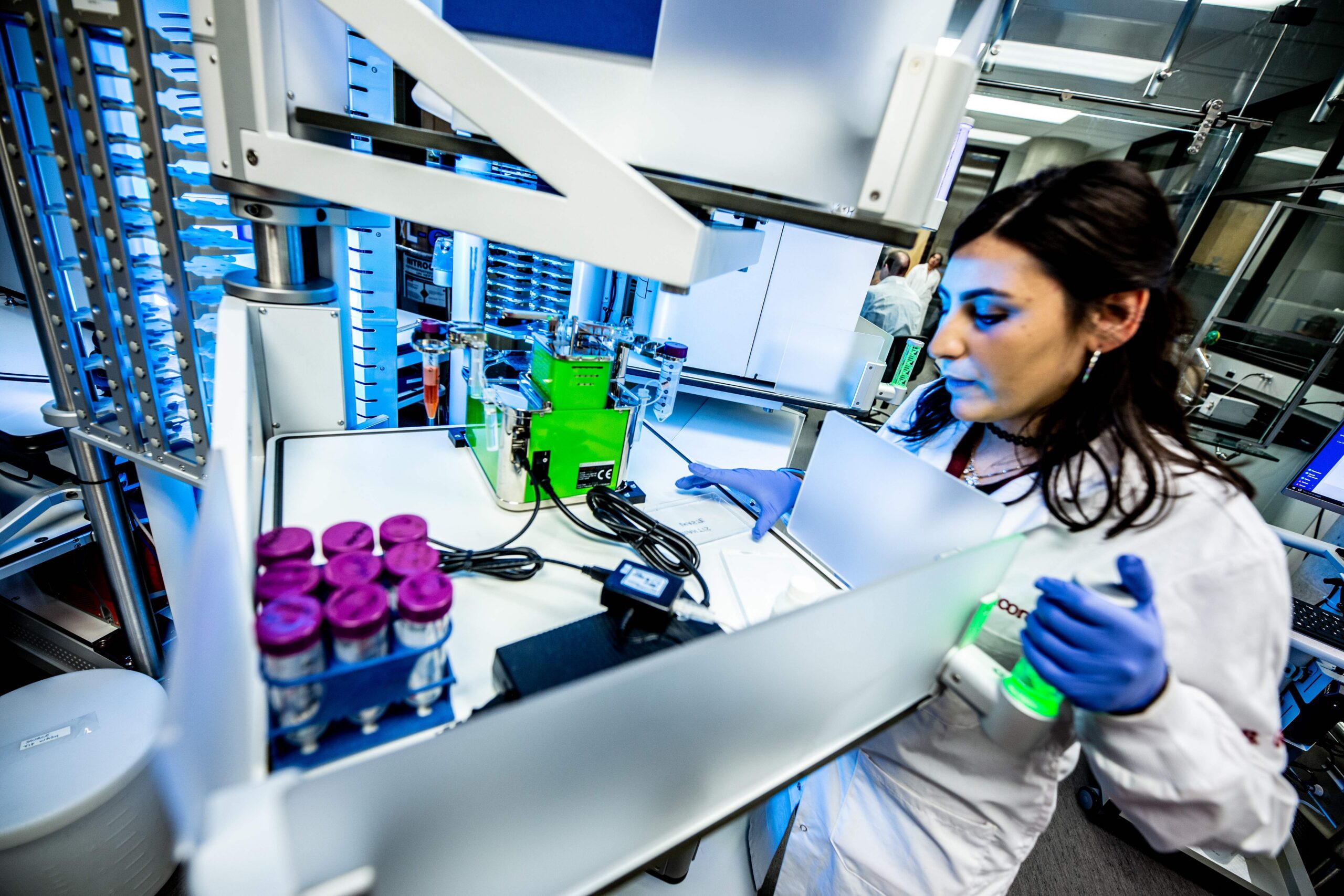 A researcher working in a genome lab.